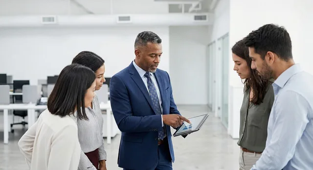 company, team, collaboration, office, meeting, technology, tablet, diverse, professionals, leadership, presentation, data, teamwork, modern, communication, strategy, innovation, group, workplace, accompaniment, ai generated. Implementing a B2B demand generation tool without stalling the sales team